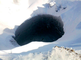 Illustration for article titled Two new mysterious giant holes found in Siberia, scientists puzzled